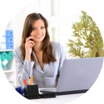 Young business woman holding the phone